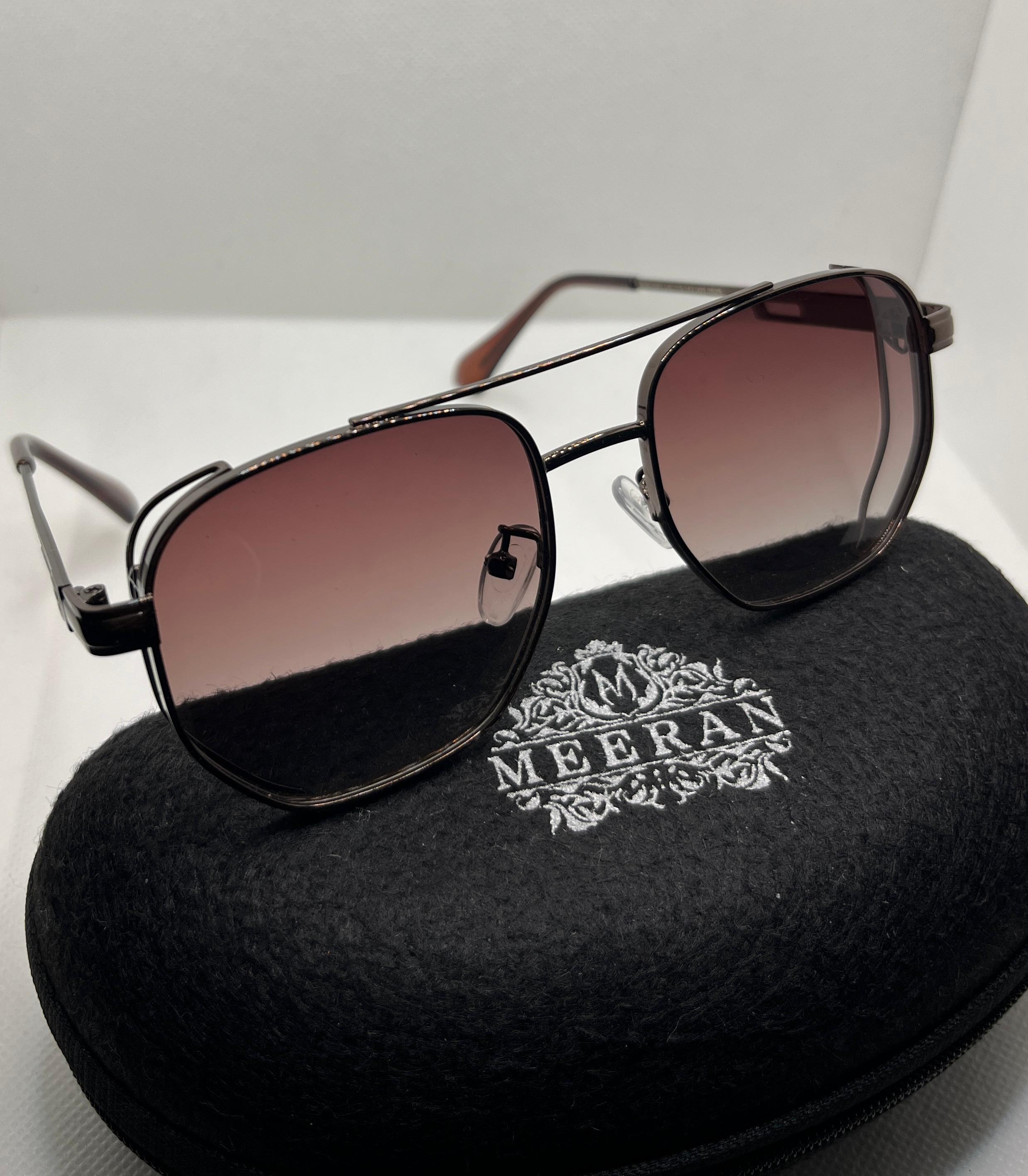Meeran polo sunglasses with brown gradient lenses and a black/brown frame, featuring UV protection